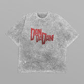 The Dandadan Oversized T-Shirt features a minimalist logo front and bold Okarun design on the back. It&