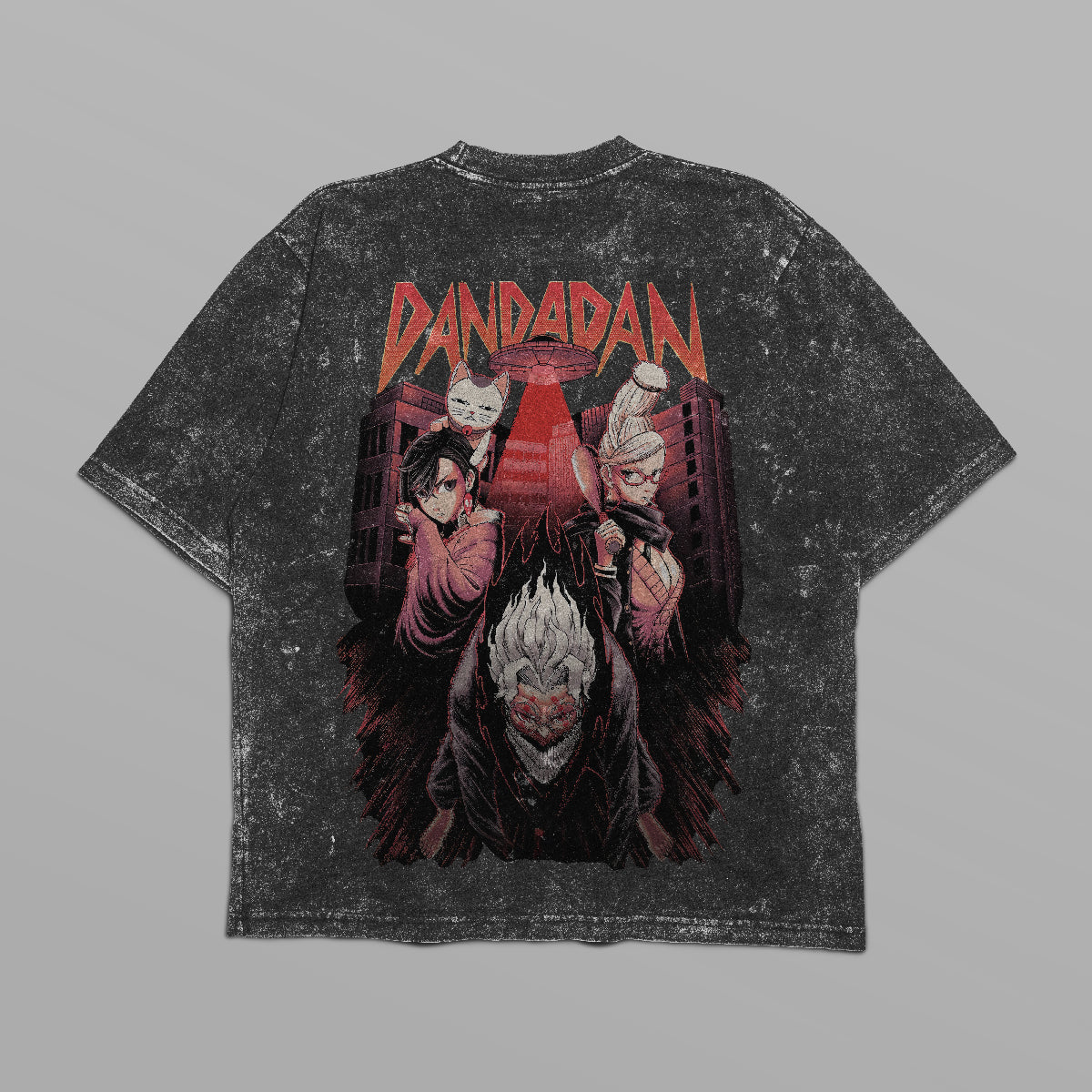The Dandadan Oversized T-Shirt in acid-washed black features a bold geometric design with four animated characters and red "Dandadan" text. This anime streetwear piece from Dandadan is crafted from 250 GSM cotton, showcasing vibrant red and black tones for an eye-catching look.