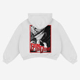The Dandadan Hoodie, crafted from premium 360 GSM cotton, features an Okarun manga panel design with a stylized grinning face and sharp teeth on a white background. "Dan Da Dan" is boldly displayed in red at the bottom. Suitable for any gender, this streetwear piece is shown from the back.