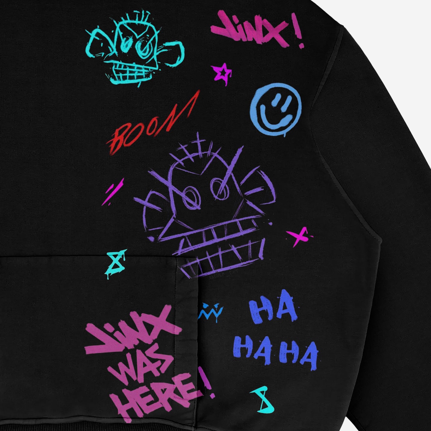The Seakoff Arcane Jinx Hoodie is a black oversized hoodie made from premium 360 GSM cotton, featuring vibrant graffiti-style artwork with stylized faces and playful phrases like "Jinx was here!", "Boom!", and "Ha Ha Ha" in bold pink, blue, and purple.