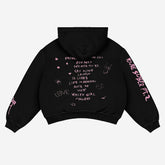 The Lil Peep Anime Hoodie by Seakoff elevates streetwear with pink and white text and doodles like "Runaway," "10 Lines," and "Life is Beautiful," plus hearts, stars, a snake, and pink sleeve text—all channeling an anime-inspired vibe.