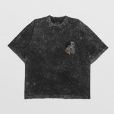 The Jujutsu Kaisen Toji Fushiguro Vintage Oversized T-Shirt features a distressed black design with a bold orange and blue graphic on the left chest. This anime streetwear has a classic crew neck and short sleeves, offering everyday comfort.