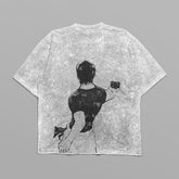 The Jujutsu Kaisen Riko Amanai & Toji Fushiguro Vintage Oversized T-Shirt offers a grunge, textured illustration of a person with a phone, set on a gray background. This black distressed anime streetwear captures an edgy, unique fashion vibe ideal for expressive fans.