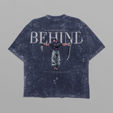 A distressed black oversized Jujutsu Kaisen T-shirt showcases Toji Fushiguro with swords and reads, "To the one who left it all BEHIND," as part of vintage anime streetwear.