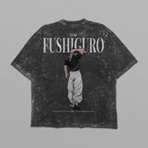 The Jujutsu Kaisen Toji Fushiguro Vintage Oversized T-Shirt features a distressed black design with a back graphic of a person in monochrome pants. "TOJI FUSHIGURO" is printed above, accompanied by smaller text, set elegantly on a light gray background.