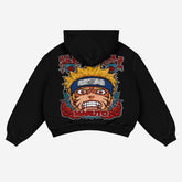 The Naruto Intense Mode Anime Hoodie by Naruto features a striking illustration of Naruto Uzumaki with spiky yellow hair and headband, capturing his fierce expression beneath the bold "Naruto" print. Designed for premium comfort, it&