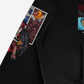 A close-up of a One Piece Hoodie sleeve by Seakoff reveals vibrant abstract designs in red, orange, blue, and white on black fabric. Crafted from premium 360 GSM cotton, this anime graphic pullover features Uta and Luffy designs with visible folds and stitching—perfect for your wardrobe.