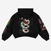 Experience the Spirited Away Anime Hoodie in white, featuring Haku Dragon & Chihiro Scene. This 360 GSM cotton hoodie blends oversized streetwear sleeves with vivid graphics, including a mask and vibrant elements, on its back. Made by Spirited Away, the hood remains plain black.