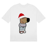 The Holiday Chill Guy T-Shirt by Chill Guy features a festive meme-inspired design of the Chill Guy with a Santa hat, gray shirt, blue pants, and red sneakers on a white tee. With an oversized head and neutral expression, it&