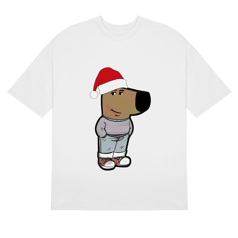 The Holiday Chill Guy T-Shirt by Chill Guy features a festive meme-inspired design of the Chill Guy with a Santa hat, gray shirt, blue pants, and red sneakers on a white tee. With an oversized head and neutral expression, it&
