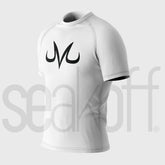The Vegeta Majin Compression Gym Shirt by Seakoff, inspired by Dragon Ball Z and made of 85% polyester and 15% spandex, features a black abstract chest logo on a short-sleeve white top. "SEAKOFF" is subtly watermarked over the shirt against a light gray background.