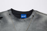 A close-up showcases the Limited Edition Death Note Long Sleeve Shirt, featuring a gray distressed design and black collar, with anime streetwear flair. A blue "seal off" tag graces the neck, enhancing its allure. Two thin silver chains drape elegantly over this unique piece by Death Note.