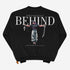 This black crewneck sweatshirt from Jujutsu Kaisen features Toji Fushiguro with arms outstretched, holding a sword and ornate knife. "TO THE ONE WHO LEFT IT ALL BEHIND" text above, additional text below, plus an orange tag on the bottom left—ideal for anime streetwear fans.