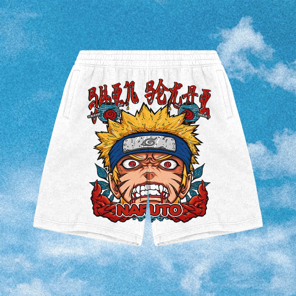 White shorts with an anime-style print showcasing a spiky yellow-haired character wearing a leaf symbol headband and an intense look. "Naruto" is boldly printed in red under the character&