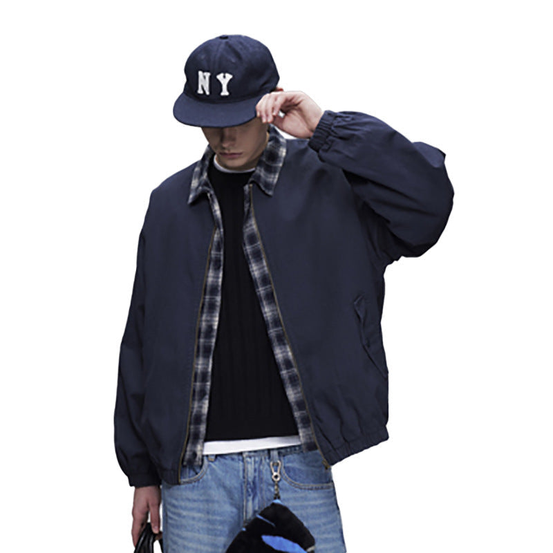Men's navy bomber jacket with plaid collar faux-layered design, zip front and elastic hem, front and back view