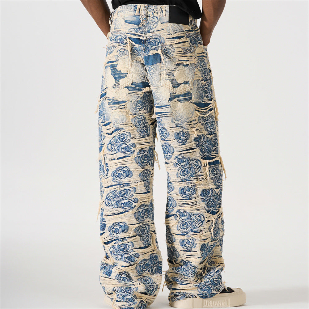 Model wearing blue floral jacquard wide leg cropped jeans, back view