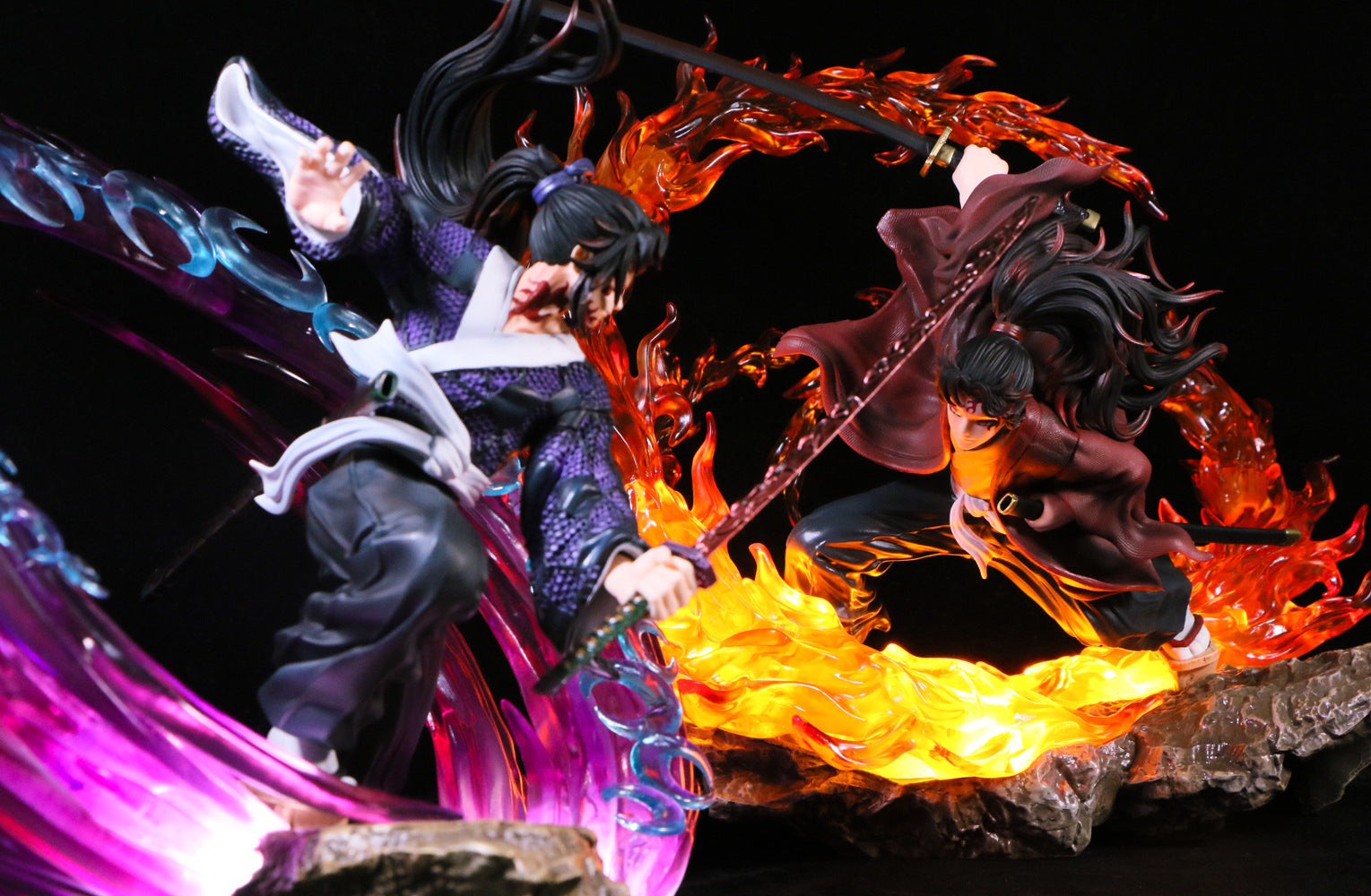 Two dynamic anime figures clash in mid-air. One is surrounded by purple energy, wielding a sword. The other has fiery red energy, also holding a sword. The scene is dramatic and action-packed with vivid colors.