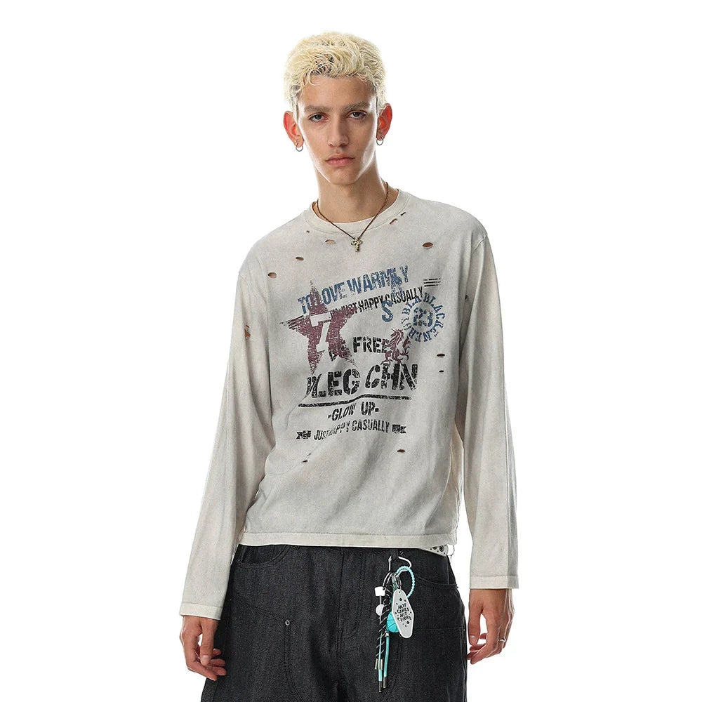 Model wearing a distressed graphic long-sleeve shirt