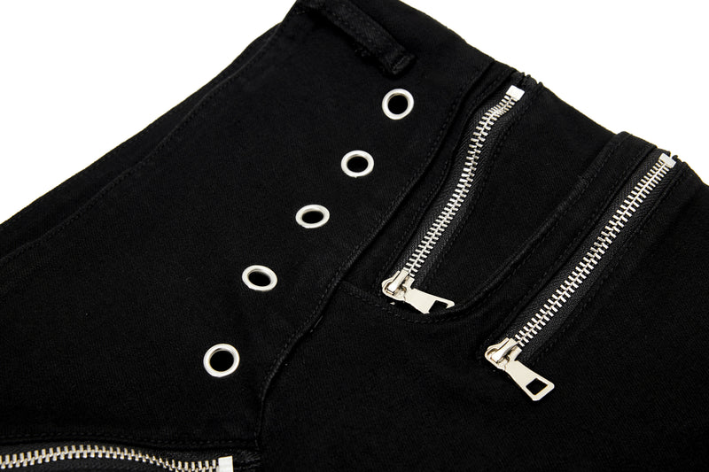 Close-up of black pants waistband with grommets and two vertical zippers