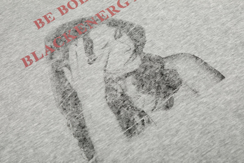Close-up of graphic portrait on gray tee