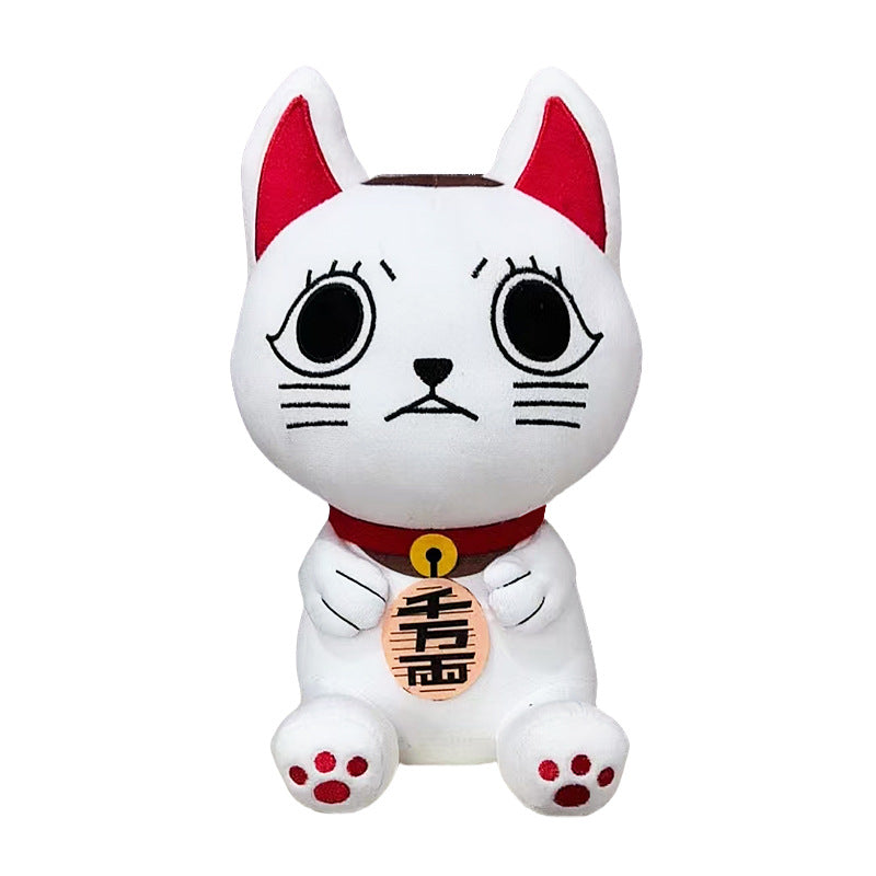 The Dandadan Anime Plush Set features a 26cm collectible cat plush with large eyes, a serious expression, red ears, and a matching collar. Made from premium PP cotton, it holds a gold coin with black markings. Predominantly white, the design is completed with pink paw pads for extra cuteness.