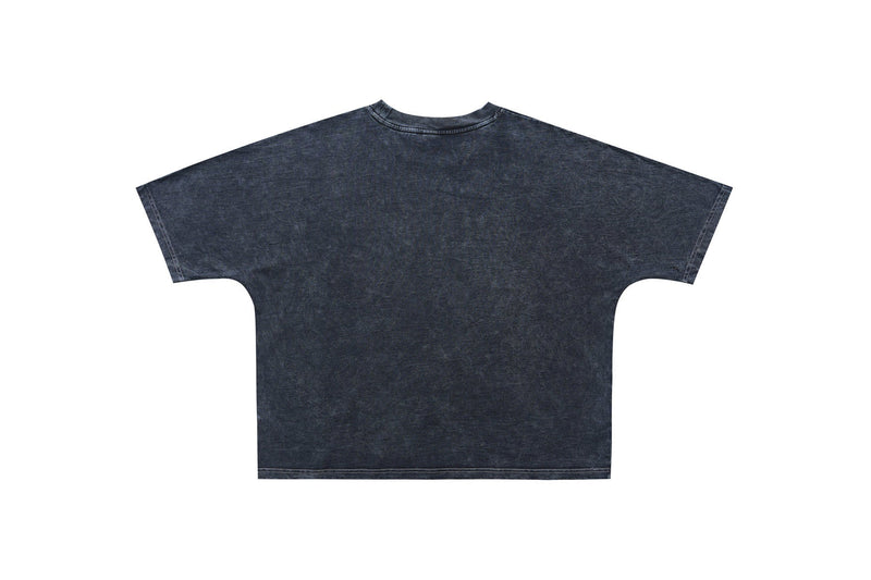 Vintage washed black gothic graphic T-shirt with oversized relaxed fit and faded distressed texture on a plain white background