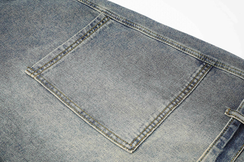 Close-up of blue jeans back cargo pocket with topstitching