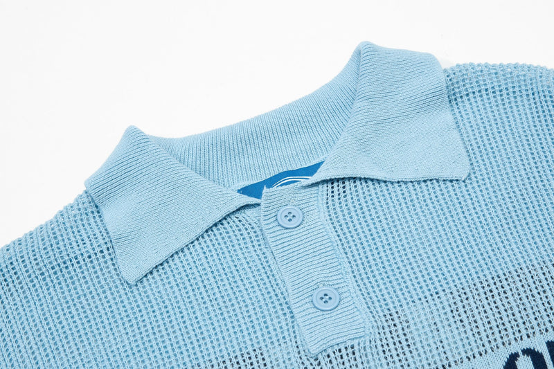 Light blue knit polo shirt with textured mesh panels, ribbed collar, and button placket in a collegiate streetwear style