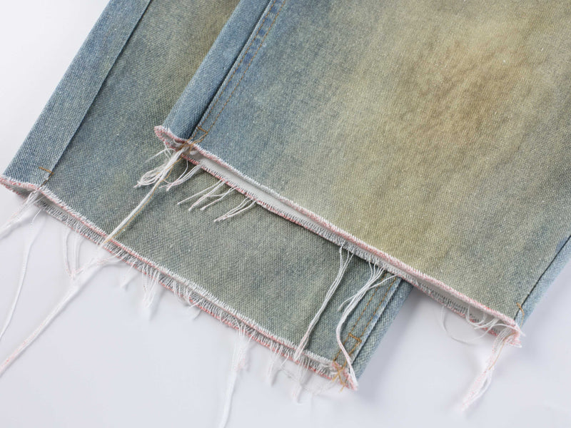Frayed hem detail on wide leg denim jeans with pinked edge stitching
