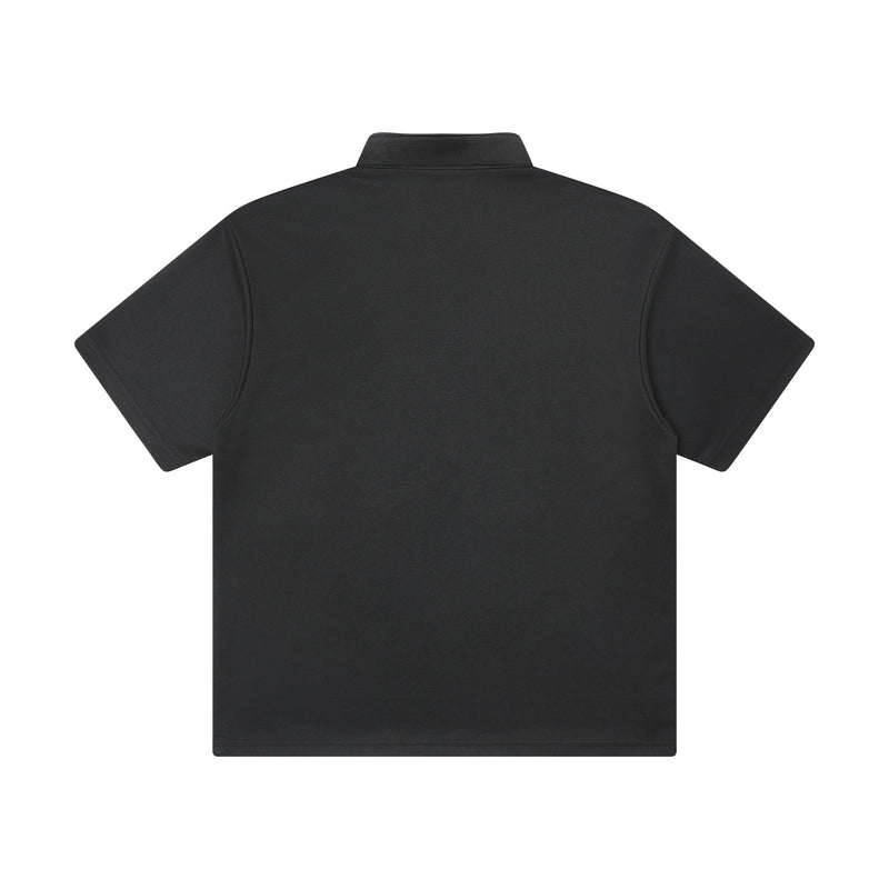 Black minimal polo shirt with short sleeves and textured knit fabric, shown flat on a white background