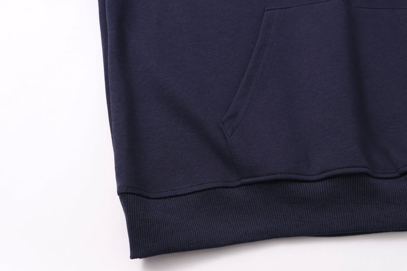 Navy hoodie hem and kangaroo pocket detail with ribbed waistband