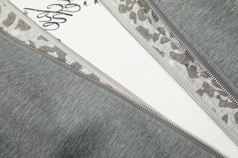 Close-up of open front showing leopard-print lining and white inner panel