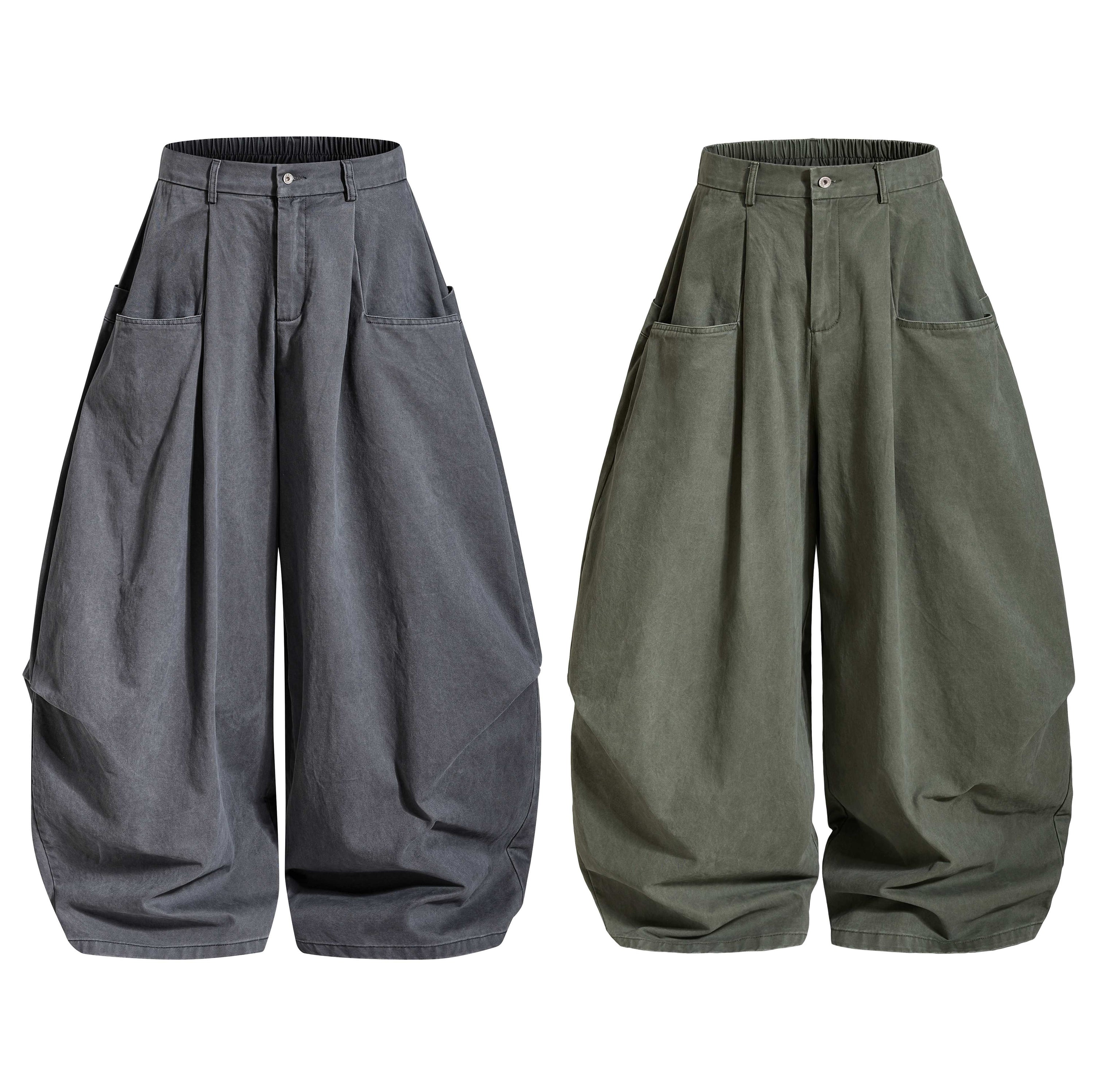 Omirad Extreme Balloon Pants in charcoal grey and army green, oversized wide-leg silhouette with patch pockets and pleated fr