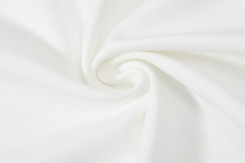 White textured fabric background with soft folded swirls, suitable for a Seakoff Knight Attack graphic polo tee