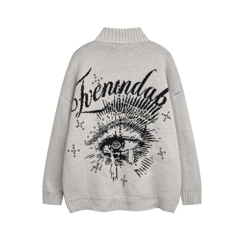 Light gray knit cardigan back view with black script lettering and eye graphic