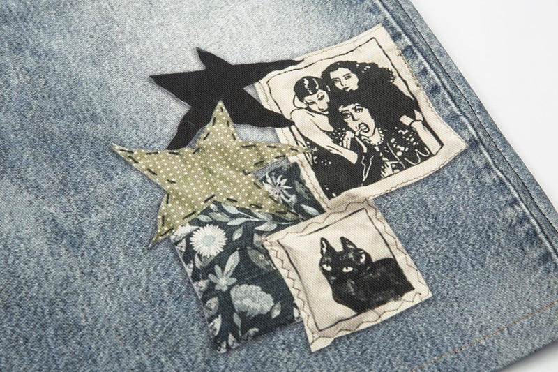 Patchwork star and figure graphic detail on light wash denim shorts