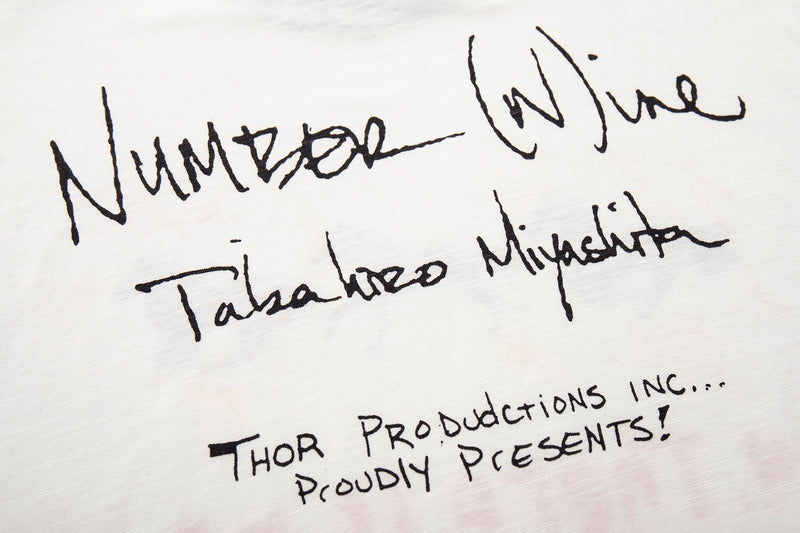 White Number (N)ine graphic T-shirt with handwritten black script print and art streetwear design