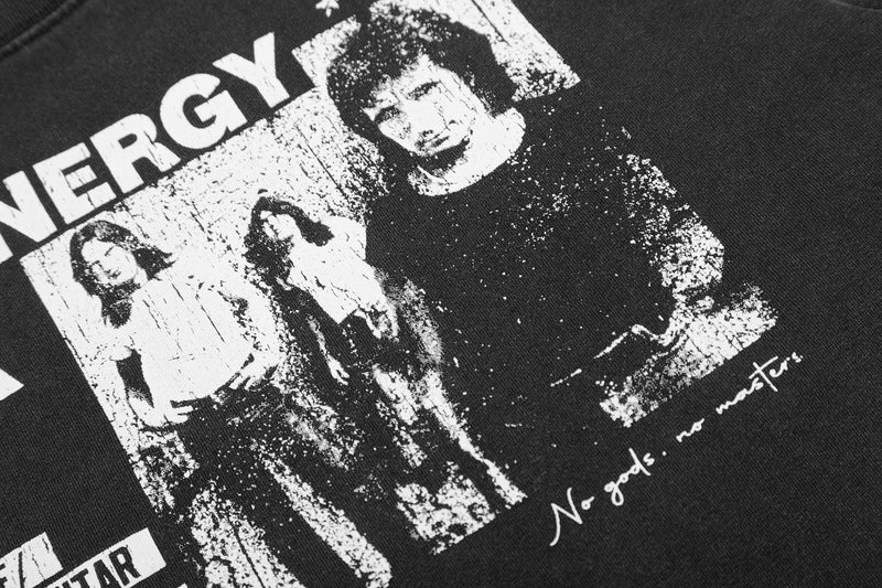 Black vintage-washed graphic T-shirt with distressed monochrome band print and text on the chest