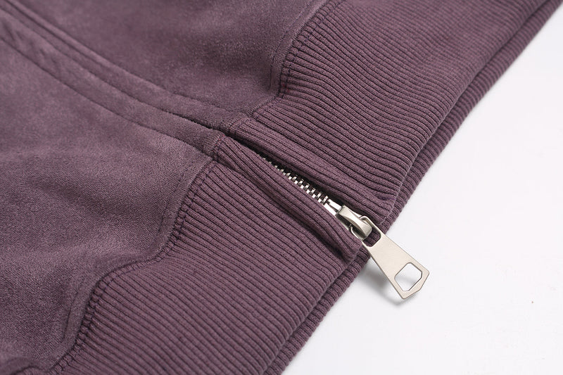 Close-up of zipper and ribbed hem on purple suede hoodie