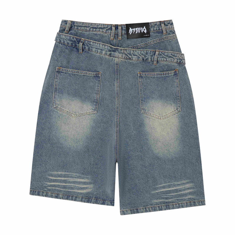 Blue denim shorts with layered waistband, faded front pockets, and distressed hems