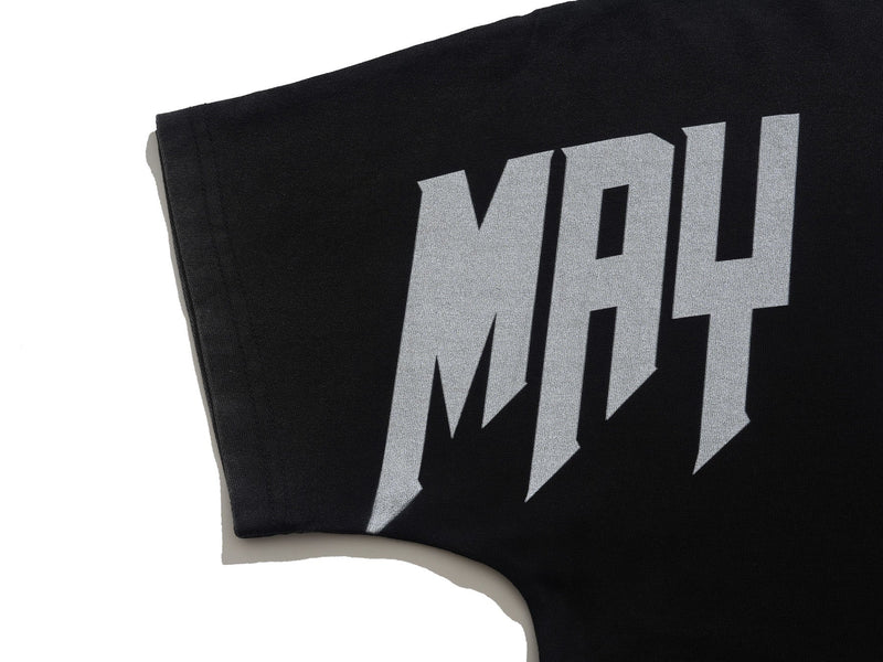 Black oversized gothic graphic tee with bold gray block lettering on the sleeve against a white background