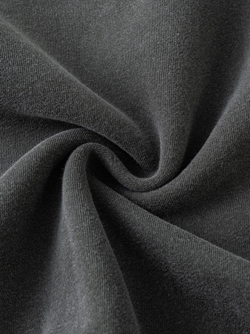 Close-up of gray hoodie fabric texture with soft folds