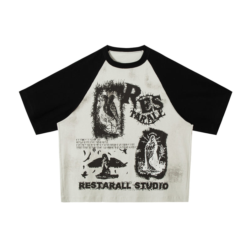 Black and white raglan graphic tee with distressed underground streetwear prints and oversized vintage-style artwork