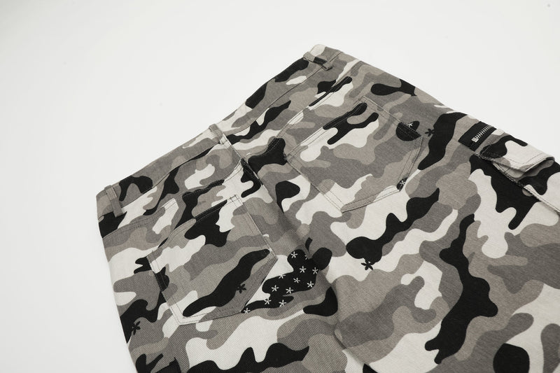 Close-up of grey camo cargo pants waistband and front pockets