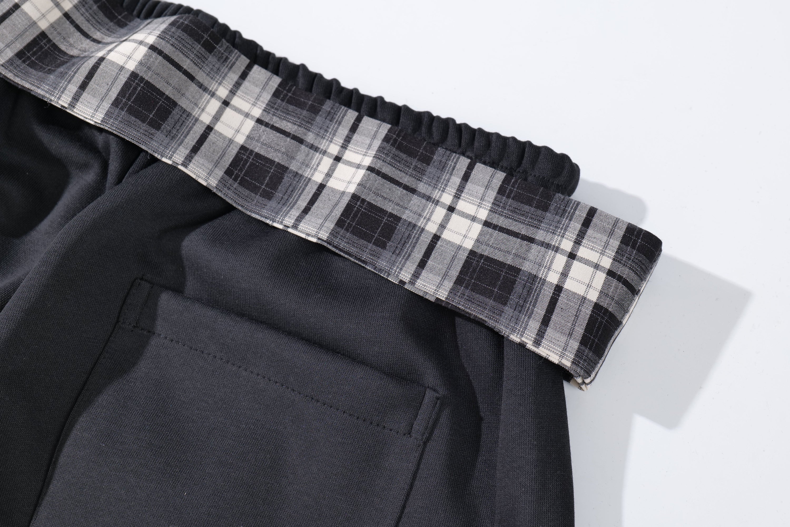 Omirad Plaid-Waist Barrel Track Pants | Bold Script Print