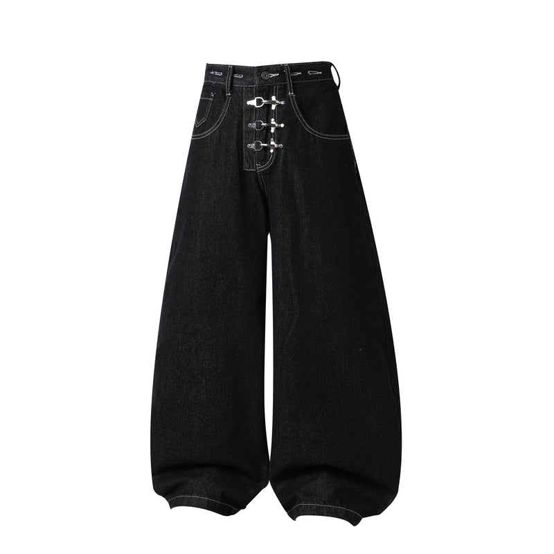 Black wide-leg jeans front waist with three buckle closures and curved pocket stitching