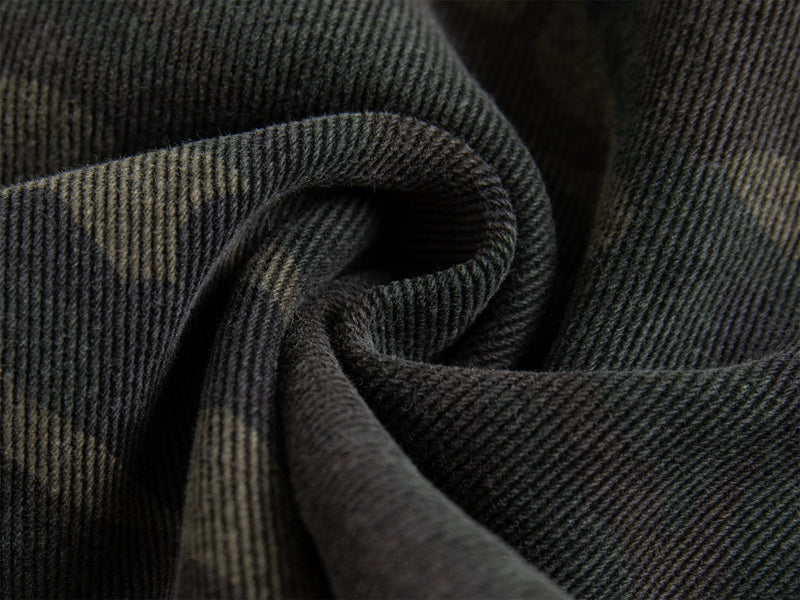 Close-up of dark ribbed fabric fold