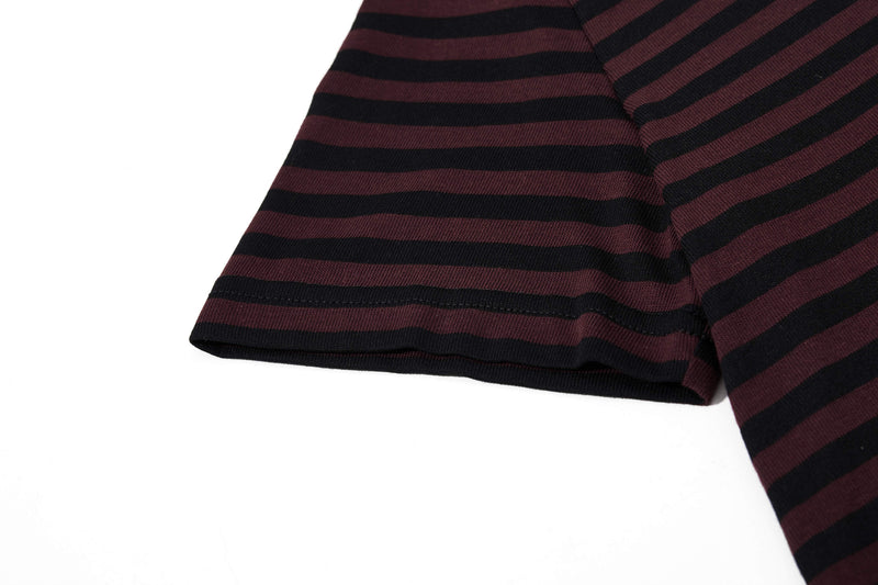 Close-up of a burgundy and black striped tee sleeve with ribbed hem and soft knit texture