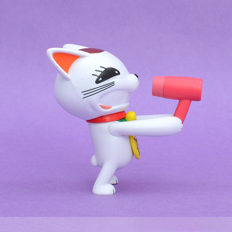 A small, white cartoon cat figurine from the Dandadan Lucky Cat series sports a black eye patch and red collar while holding a red toy hammer. This kawaii style PVC figure stands against a solid purple background, measuring 9.5 cm tall.