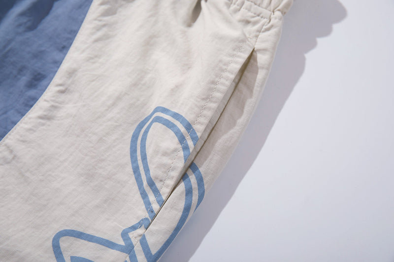 Omirad Graphic Panel Track Pants | Wide-Leg Streetwear
